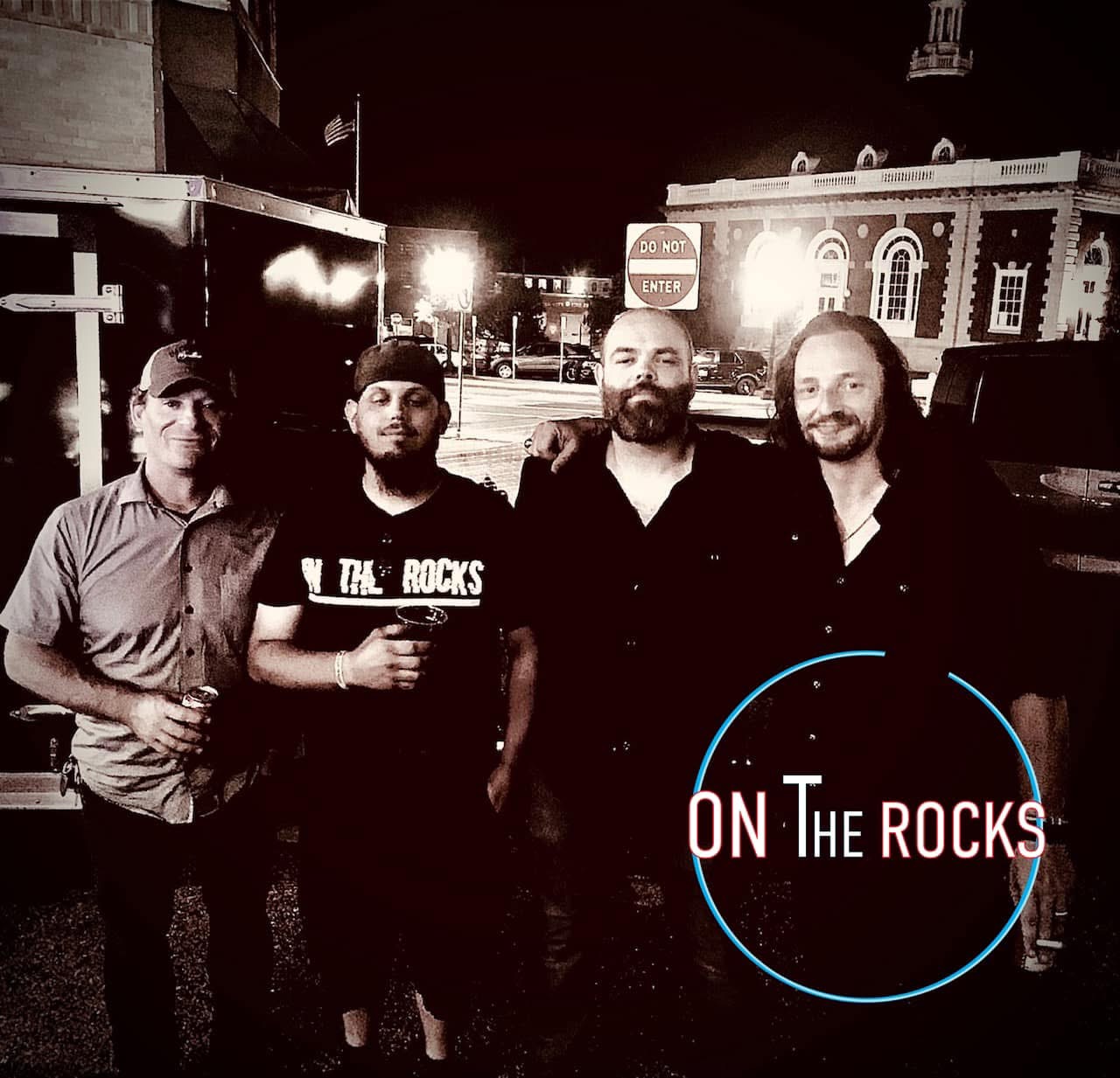 On The Rocks together under the streetlights after a show